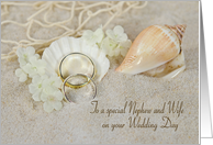 Nephew’s wedding, rings in beach sand with seashells and net card