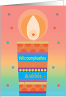 Birthday in Spanish, with brilliantly colored candle and wording card